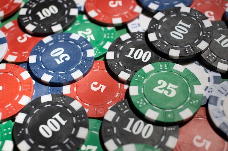 Live Casino Hold'em dealer table with cards and chips
